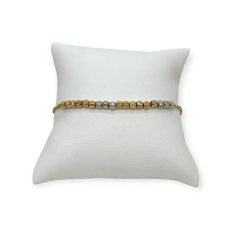 Bracelet boules en trois or...