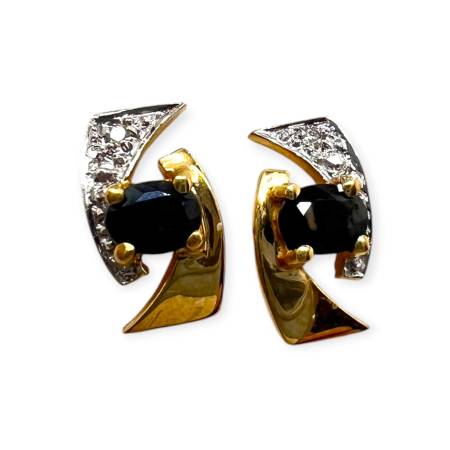 Boucles d’oreilles en deux...