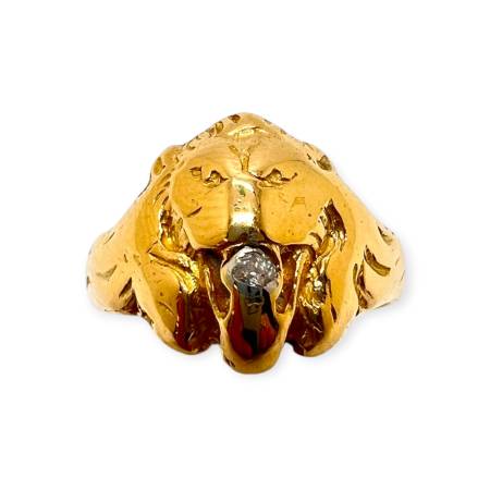 Bague tête de lion en or...